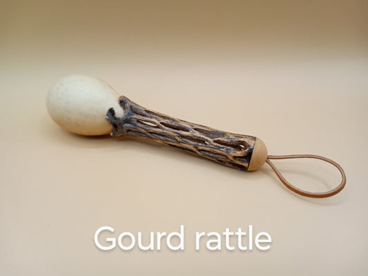 Dried gourd rattle with hollow wooden handle