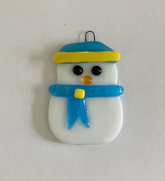 fused glass snowman ornament. blue hat and scarf with yellow trim