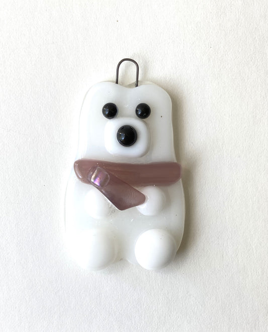 Fused Glass Ornament  Polar Bear wearing a lilac colored scarf with an iridescent accent  1.25" long x 2.5" high x 1/4" wide fused glass  Wire hook attached for hanging