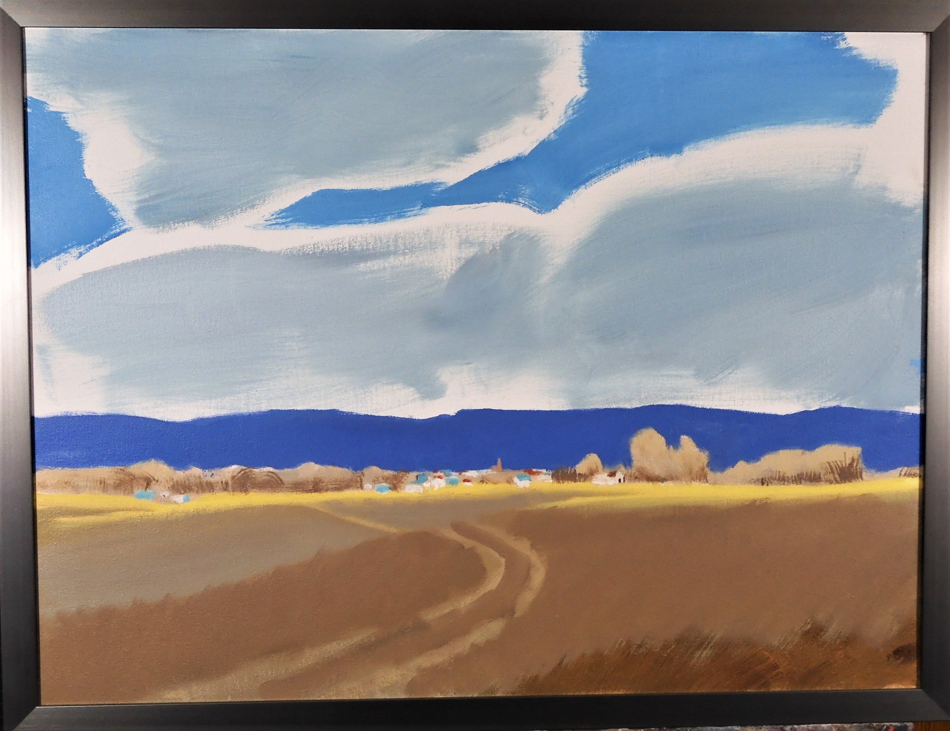 " Almost There " Framed Original Oil Painting Artist: Jon Madsen  Original oil painting  Large clouds above a distant town  24" long x 18" high original oil painting  25" long x 19" high in a dark silver colored frame  D-ring and wire on the back for hanging  Please note item is an original from the artist     From the artist:  Driving home with the sun at my back