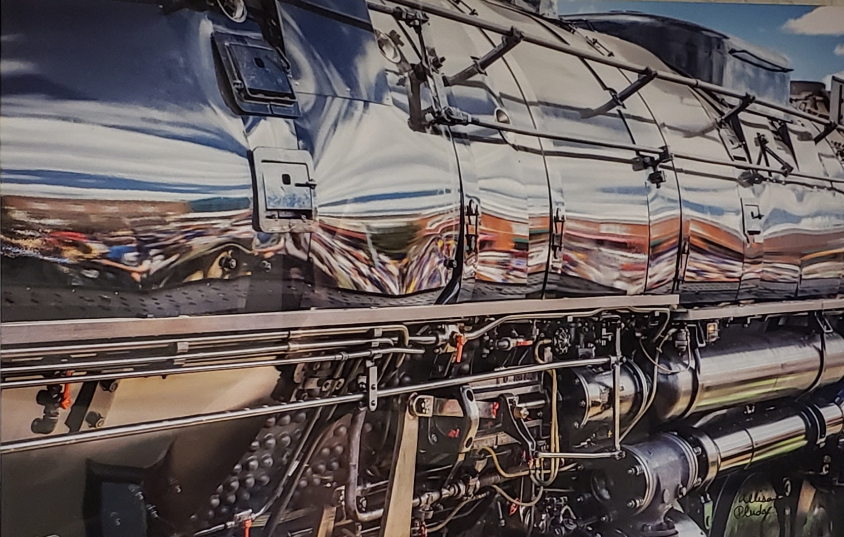 Big Boy 4014 Steam Engine  Photographer: Allison Pluda  12" x 18" Metal print  Big Boy 4014 Historic Steam Locomotive  Downtown Laramie Reflected in the Engine