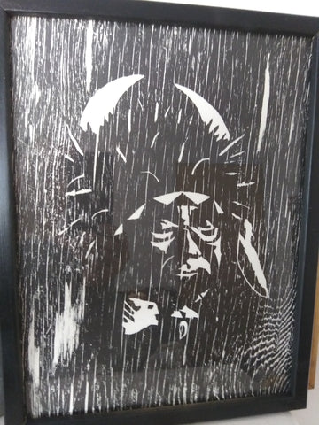 "Chief Buffalo Bull" Wood Cut Print Artist: Bruce Allemani  Wood cut print framed in black  Framed picture of chief buffalo bull in black and white tones  14" long x 10 1/2" wide x 1" deep  Wire attached on back for hanging  Please note items are handmade and there might be a slight variation between pieces