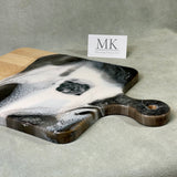 Our wooden boards are handmade, sanded and conditioned for functionality and longevity. This wildlife serving board was created with artwork using resin as the medium by the artist herself resulting in a true original work of art. The decorative elk emblem along with ribbons of 24K gold were added to showcase in your home decor beautifully.