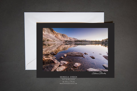 mirror reflexion in the lake of the Snowy Range Mountains of Wyoming. blank card with envelope