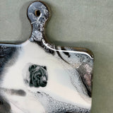 Product Features: • Handmade, High Quality, an Original • Solid Maple Hardwood • Dimensions: 18" L X 10.5" W X .75" H • Artistically Crafted with pure Silver Accents • Bear Pencil Sketch Decal • Original Resin Artwork by the artist herself • Treated with an organic house-made wood condition
