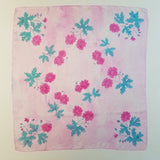 wild geraniums painted on a silk shawl. 29 inch by 29 inch. pinks and teals