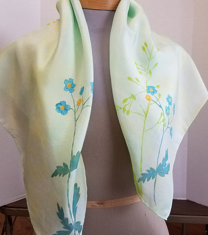 blue flowers hand dyed on silk shawl. 29 inches by 29 inches