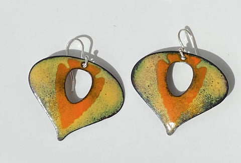 tear drop shaped enamel earrings. orange arrowhead on a yellow background