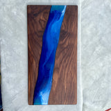* Dimensions: 24IN X 12IN. Please keep in mind that due to the handmade nature of all of our products, dimensions may vary slightly.  * Recessed grips  * Hand Painted with Eco-Friendly Resin Epoxy; food-safe  * Rich Pigments: Phthalo, olive martini, and emerald green tones  * Sanded and polished with organic food-grade beeswax and mineral oil  * Gently hand wash and towel dry – not dishwasher safe  * Do not leave soaking in water.