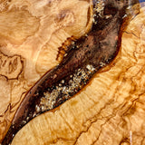 Product Features:      Handmade, High Quality, an Original     Stunning Olive Wood Slabs     Artistically Crafted with Accents     Top-coated with a durable counter-top quality protective seal     Wyoming Steamboat Bronc & Rider Decal     Original Resin Artwork by the artist herself     Bullnose Rounded edges     Dimensions: 24" L X 24" W X 1" H (measurements are approximate given the handmade nature)