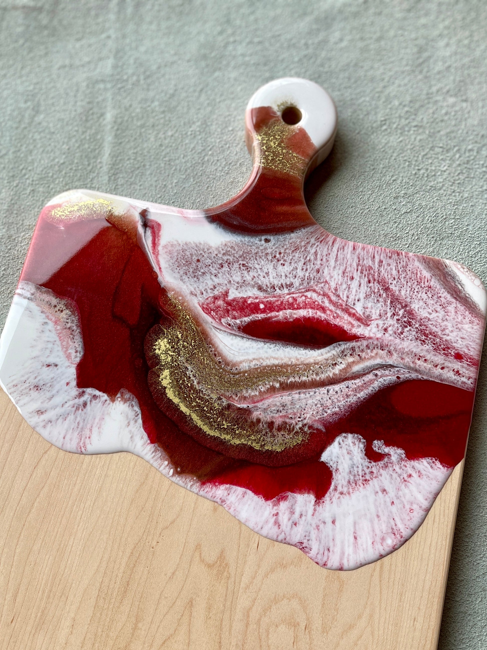 Maple artisan cheese board with handle. red, white and gold resin