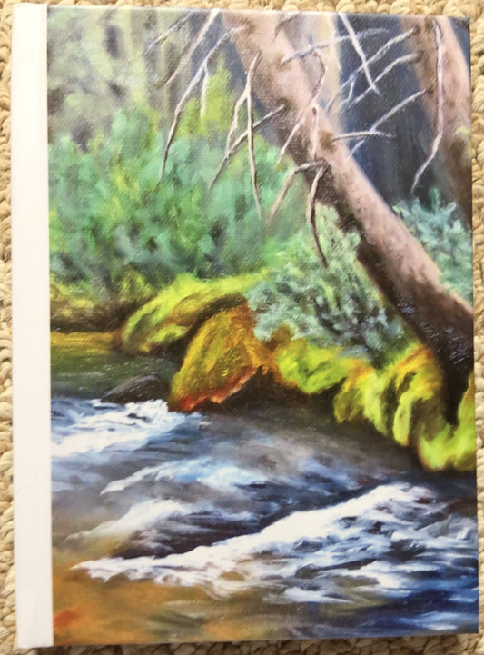 "Deep In The Forest" Hard Cover Journal Artist: Laurie LaMere Hard Cover Journal featuring artwork from the artist  Artwork covers front and back of the journal cover  6" long x 8" high  Lined pages in the journal with page mark ribbon   
