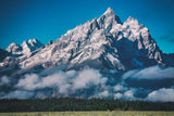 Grand Teton National Park,  Jackson, Wyoming. Majestic peaks rising above the forest and clouds. Barnwood style horizonal frame with easel