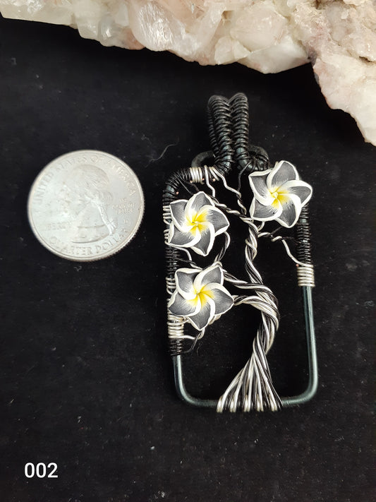 Plumeria Tree Pendant Artist: Lindsey Griffin Polymer clay flowers  Black and Silver Colored Wire  2.5" x 1" Necklace