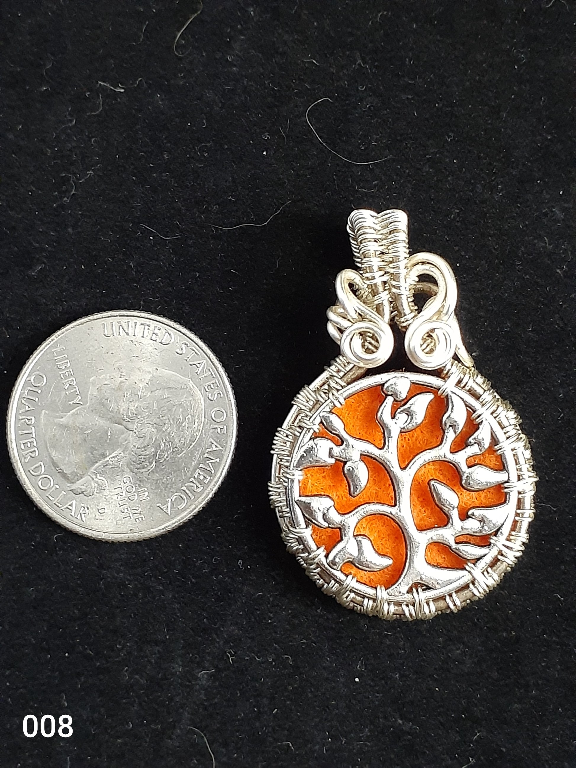 Wired Wrapped Essential Oil Tree&nbsp; Necklace  Artist: Lindsey Griffin  Wired Wrapped Essential Oil&nbsp; Necklace   1 7/16" long x&nbsp; 1 7/16" wide   Extra Felt pads for other Oils and&nbsp; Copper Wire Wrapped   Nice necklace piece for any neckline   Please note Items are handmade by Artist