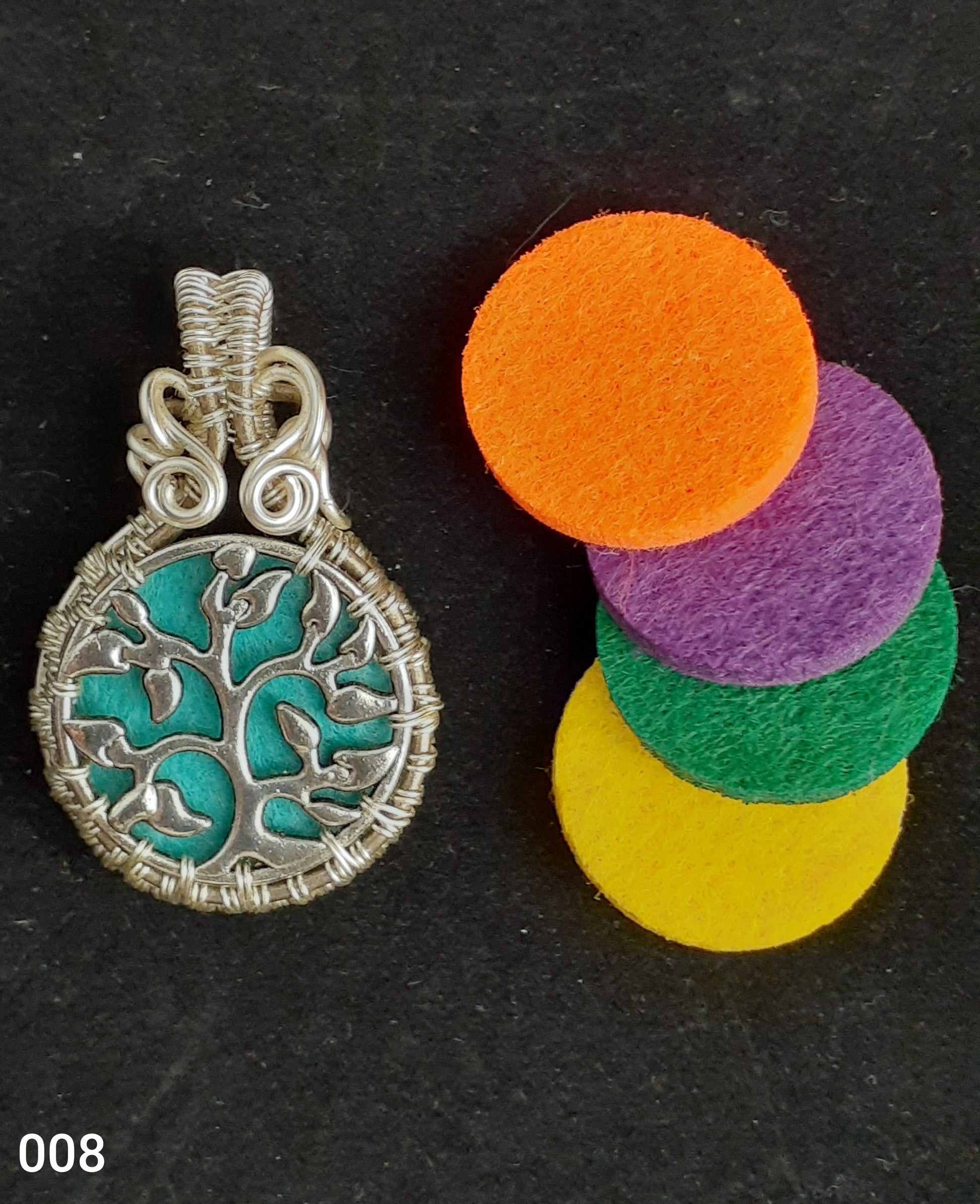 Extra Felt pads for other Oils and Copper Wire Wrapped   Nice necklace piece for any neckline   Please note Items are handmade by Artist