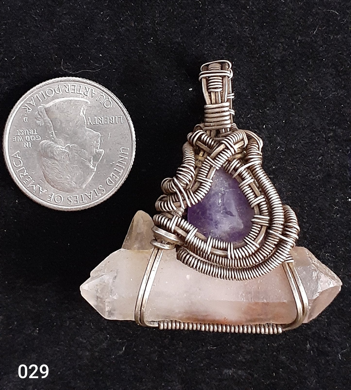 Double Terminated Amethyst A-Frame Necklace Artist: Lindsey Griffin Double Terminated Amethyst A-Frame Lithium Quartz 3" long x 7/8" wide  Silver Wire  Nice necklace piece for any neckline  Please note Items are handmade and Stones are Hand Dug by Artist