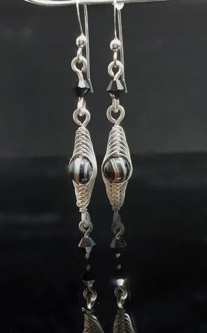 Botswana Agate wrapped in silver wire with Swarovski crystals. Sterling Silver ear wires