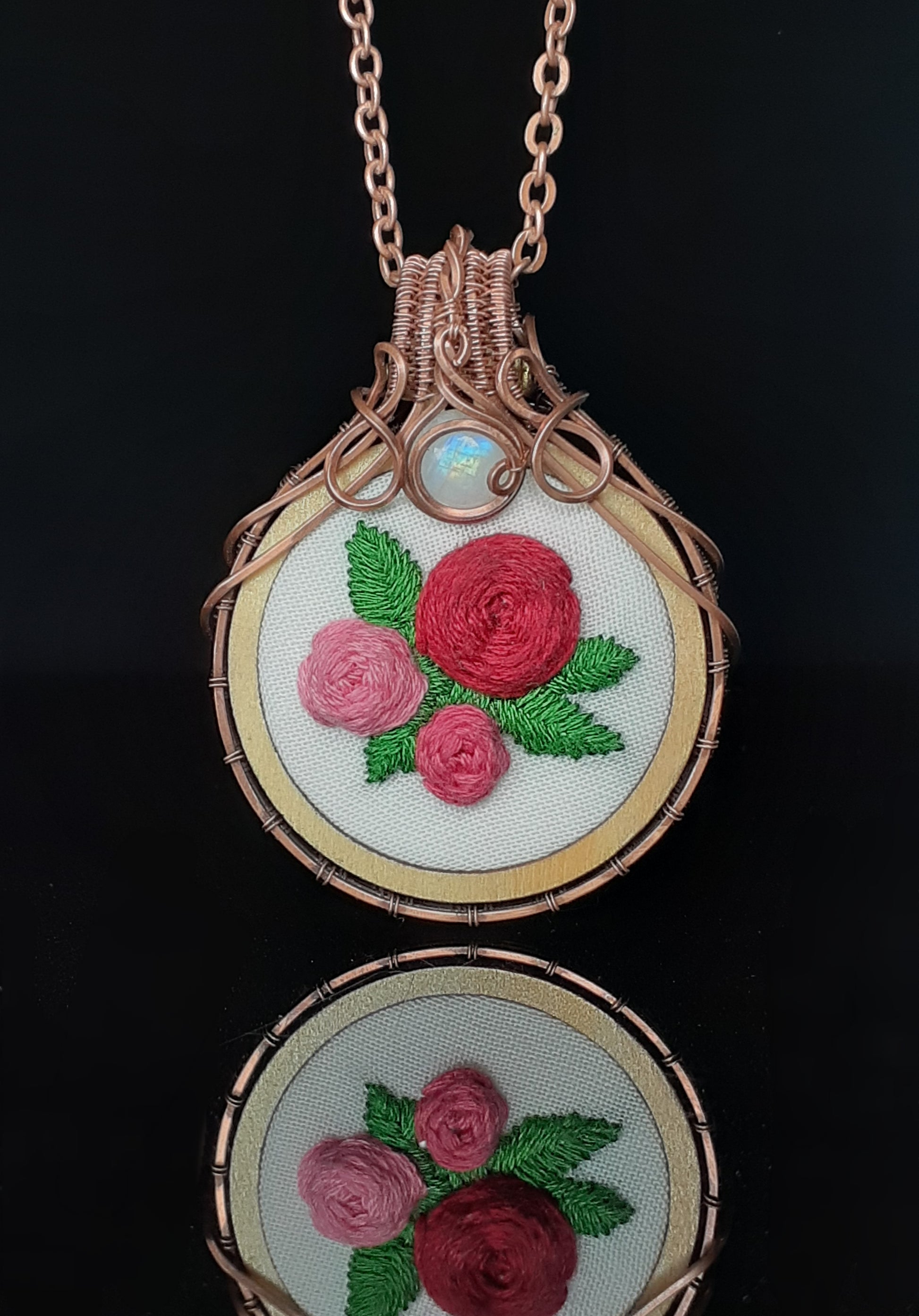 rose embroidered pendant