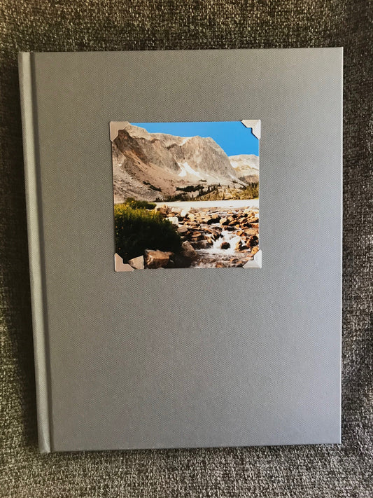 Lake Marie, Wyoming at Medicine Bow Peark on a journal. Lake Marie Sketchbook Artist: Lisa Edwards - Photographer Color image of Lake Marie in the Snowy Range Mountains, Laramie WY  Grey Sketchbook  Hardcover  11" x 9"  Blank, White Pages