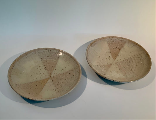small stoneware dinner plate in cream and tan glaze with speckles