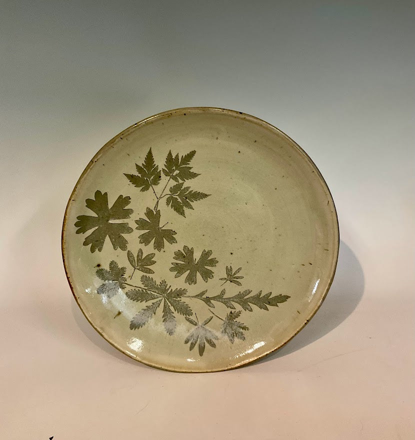 Leaf Design Gray Glaze Stoneware Plate Muffy Moore: Ceramic Potter Hand thrown stoneware plate  Gray glaze with leaf pattern  10 1/2" across x 1 1/2" tall  Will make a large dinner plate or small serving platter