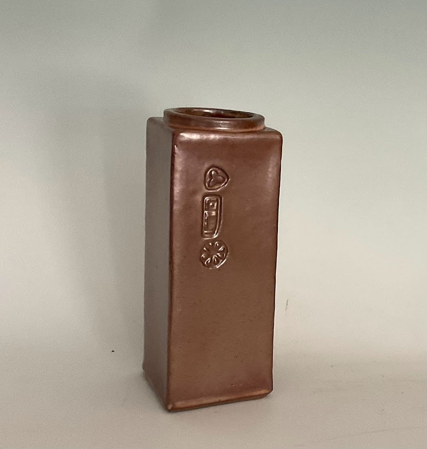 Shino Stoneware Vase Muffy Moore: Ceramic Potter Square Stoneware Vase  Shino glaze  3 Stamps  Dishwasher safe, oven and food safe  3" long x 3" wide x 7 1/2" tall  2" round opening  Perfect for a bouquet of flowers