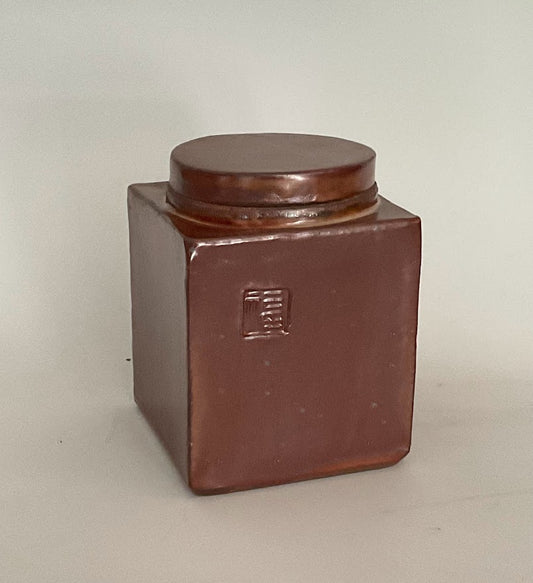 Shino Glaze Lidded Jar With Stamp. Muffy Moore: Ceramic Potter Hand thrown stoneware  Jar with lid  Shino glaze  Stamp on one side of the jar " Happiness "