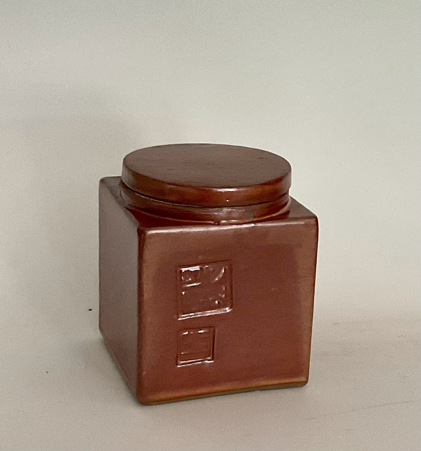 Short Square Lidded Jar With Two Stamps, shino glaze