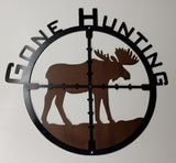 Gone hunting bull Moose metal sign, hand crafted. layered sign with black painted scope sign in front layer, and back layer sandblasted rustic patina finsih with silhouette cutout of a bull moose. Clear coat enamel protective finish