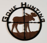 Medium metal sign of bull moose Gone Hunting Sign. Black painted scope sign in front layer and back layer sandblasted rustic patina finish with silhouette cutout of a Bull Moose. Clear coat enamel protective finish.