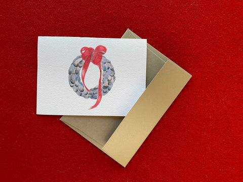 Classic, professional styled greeting cards. These are created from the Artist's original watercolor painting. Here, a wreath, created from mussel shells and accented with a red ribbon creates the card. The card is blank inside for your personal message. It comes with a metallic gold, heavy paper envelope for the ultimate in greeting cards.