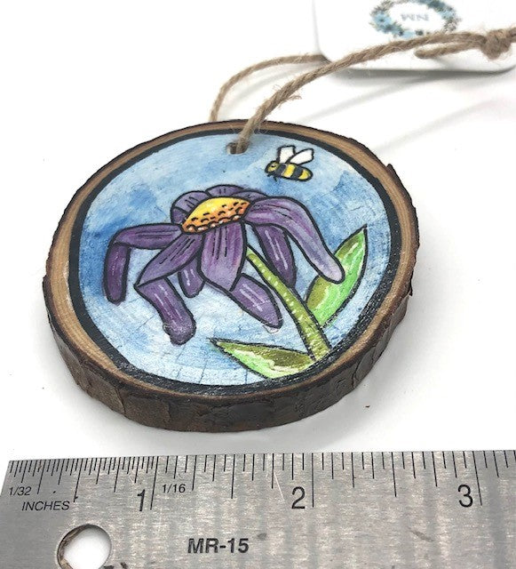 " Bumble Bee " Hand Painted Wooden Ornament Artist: Nancy Marlatt  Hand painted natural wood slice with a jute string attached  Original watercolor painting  Actual size and weight varies per piece.  2.75" x 2.75"x  .25"