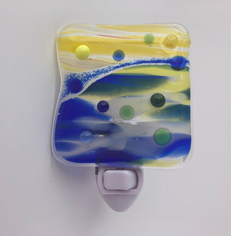 blue, yellow and green striped square with glass dots. nightlight