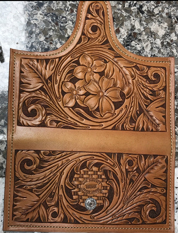hand tooled leather ladies clutch. 3 flower pattern. bill pocket and 5 card slots. snap closure