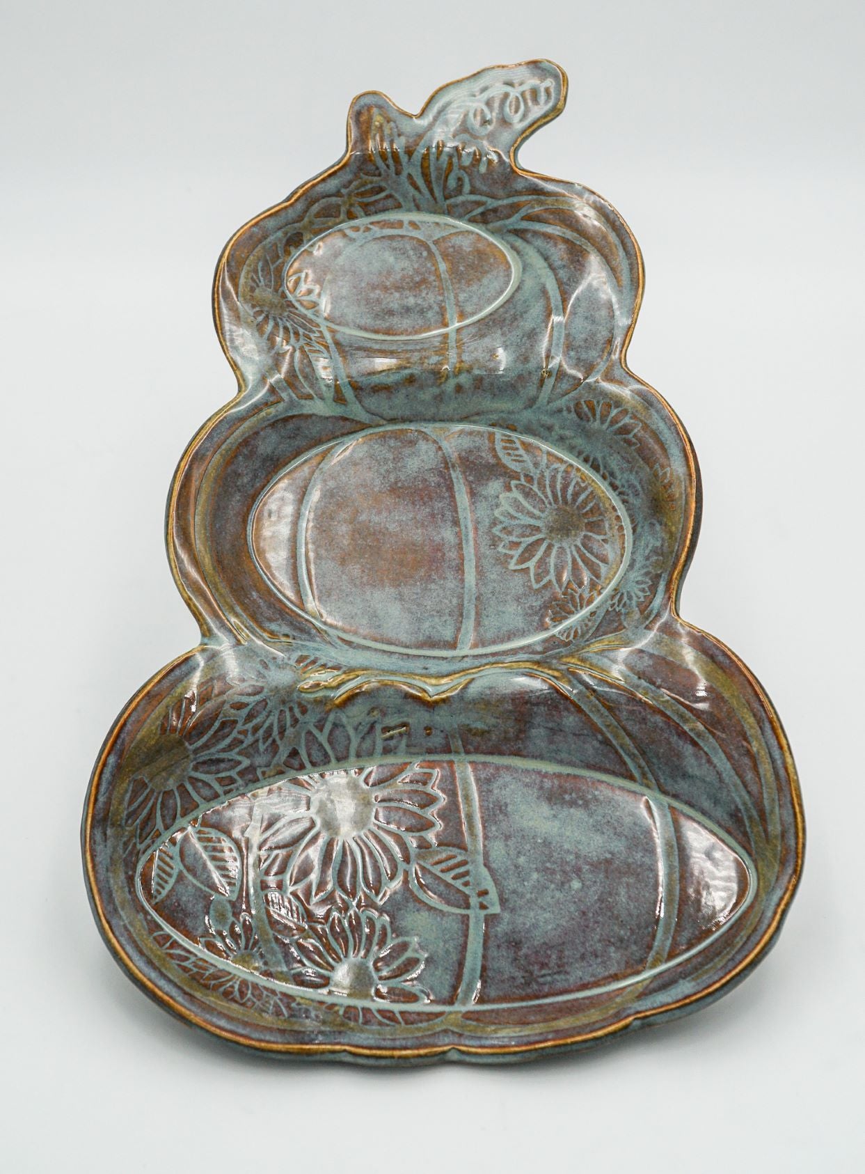 Sectional Pumpkin Ceramic Platter Ceramist: Tamara Rodgers  3-part sectional pumpkin and sunflower serving platter  Stonewear dimensions:  13.5 inches long, 9 inches wide at base, 7 inches wide middle, 6 inches wide top  Silver Sage Ceramics
