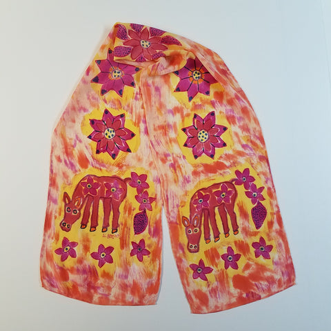 grazing pony in peruvian style art. hand dyed and painted on a crepe de chine silk scarf