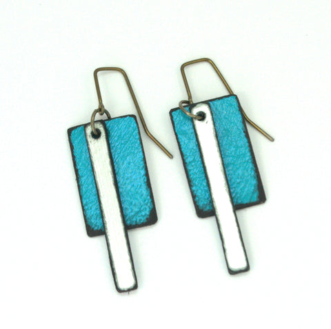 Bronco Sue Turquoise / Silver Raw Hide Leather Earrings Artist: Dave Rowswell - Leather Artists Large Brown Rectangle / Long Skinny Gold rectangle   Tanned Leather / Light Weight  Brown / gold big / small long rectangles  Hand dyed vibrant colors on rawhide   Antique colored ear wires   Matt Finish   5/8" Wide x 2" Long x 1 1/2" Deep  Great with a pair of jeans or with an out on the town outfit