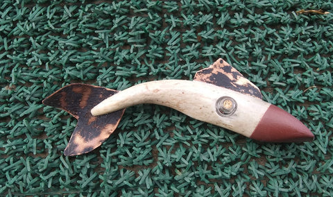 Antler with a brown Pipestone head  Hand cut copper fin and tail  Small " wishing bottle " inserted into the antler  6.25" long x 2" wide x 1" high