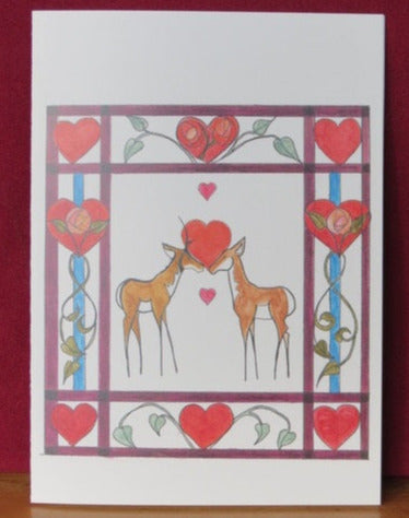 Design is from an original drawing by the artist  Two Pronhorn (Antelope) with hearts between them  Maroon boarder with hearts, greenery and roses  4" long x 5 1/2" high blank card with envelope  Great Valentine's Day card for the ones you love