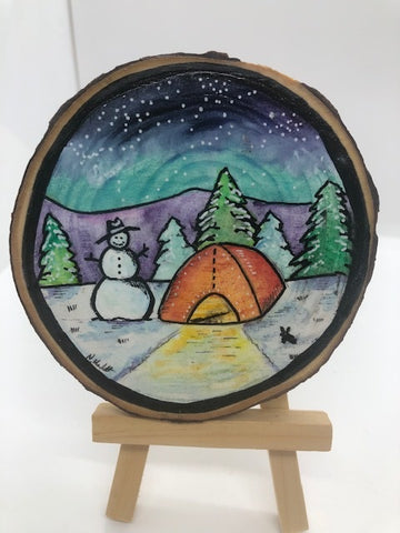 Two unlikely friends meet up in the woods; a snowman and a rabbit  3.5" to 4" Hand Painted round wood slice magnet  Painted with an original mixed water media  Surface is sealed with a magnet attached to the back of the wood slice  Ready to hang on a magnetic surface or displayed on an easel (not included)  Title of the artwork piece written on the back